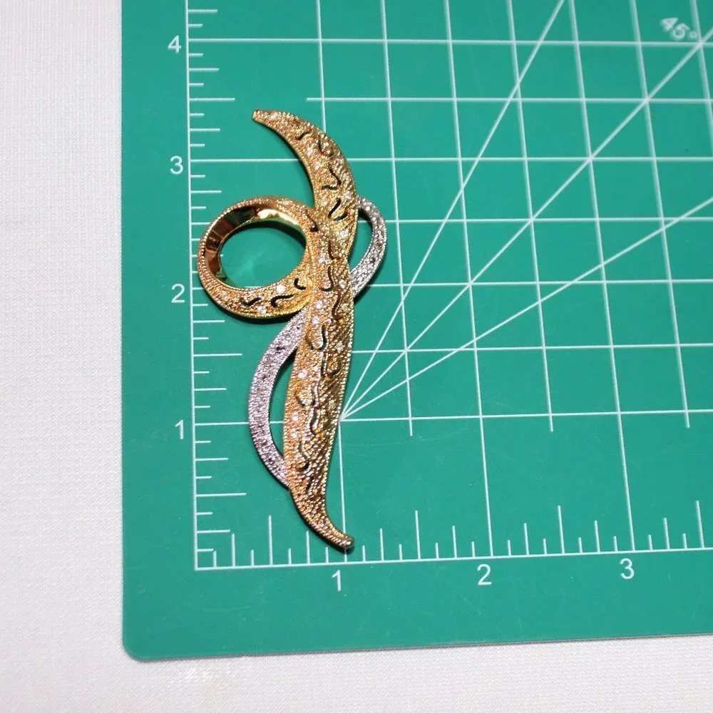 Avon Silver and Gold Tone Swirl Brooch with Rhinestones